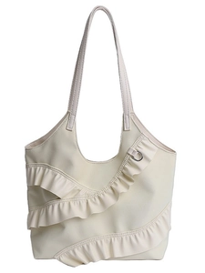 Chic beige lace ruffle tote bag with bow detail and leather straps for casual commuting