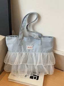 Light blue denim tote bag with tiered tulle lace trim and Fashion Bag letter patch