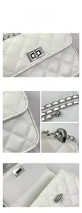 Close-up of white quilted leather bag showing silver turn-lock and chain strap details