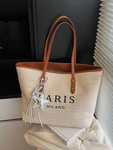 Rainbow woven straw tote bag with brown PU leather handles and star tassel charm