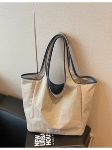 Große beige und marineblaue Kontrast-Tragetasche aus Segeltuch für den täglichen Pendelverkehr
