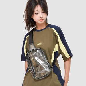 Close-up of a grey transparent PVC crossbody bag featuring the KLEIMAN white logo detail