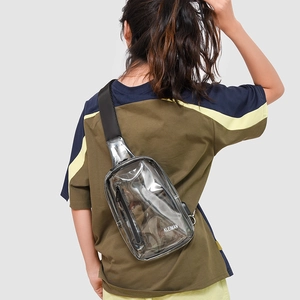 Detail of transparent PVC chest bag with black trim and adjustable shoulder strap