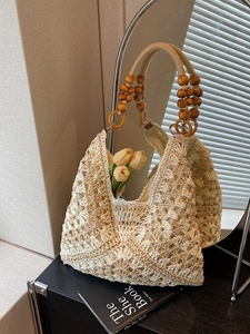 Chic beige crochet tote bag with wooden bead handles and hollow geometric knit pattern