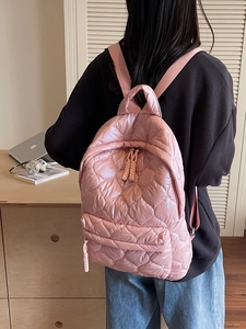 Pink quilted backpack for women featuring soft heart texture and large capacity