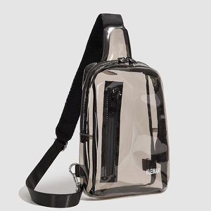 Detail of smoky gray transparent chest bag with adjustable mesh padded strap and zip pockets