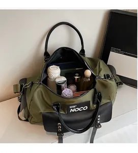 Open view of military green travel bag showing large capacity for water bottle and umbrella