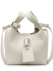 Sac seau minimaliste en cuir beige avec poignée supérieure et bandoulière