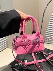 Pink lychee grain leather mini shell handbag with silver ring hardware and top handles