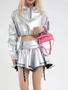 Y2K style silver metallic two-piece set with long sleeve zip top and pleated mini skirt