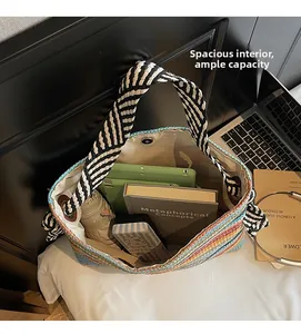 Top view of large woven tote bag showing spacious interior for tablet and essentials