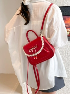 Zaino in pelle rossa con pizzo e ciondoli a ciliegia per donna stile dolce moda