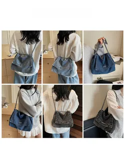 Detail showing versatile styling of the denim chain bag as a shoulder or crossbody purse
