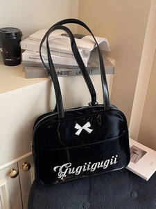 Black glossy patent leather tote bag with white bow and embroidery for daily shoulder use