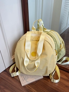 Leichter cremeweißer Damenrucksack und Handtasche für Pendler und Schule in Gelb