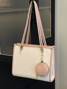 Elegant white tote bag with pink trim and F-flower embossed texture featuring a coin purse