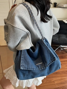 Fashionable dark blue denim chain tote bag with minimalist silver metal trim for women