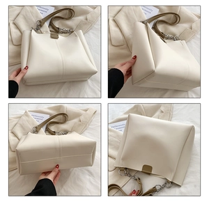 Detailed views of white PU leather tote bag with brown chain strap and side buckles