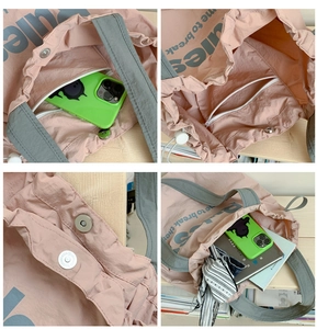Detailansicht der rosa Nylontasche mit Reißverschlussfach und Magnetverschluss innen