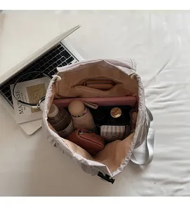 Top view of spacious grey backpack interior with organized storage for laptop and essentials