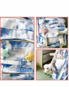 Detail view of tie-dye backpack showing high-quality stitching and buckle details
