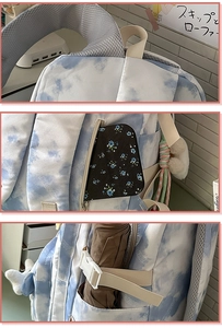Detail of tie-dye backpack showing breathable mesh straps and side buckle pocket