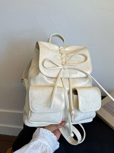 Chic off-white pleated PU leather backpack with bow drawstring and front pockets