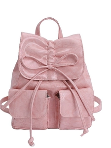 Pink faux leather women's backpack with bow decoration and adjustable shoulder straps