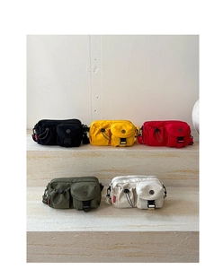 Nylon crossbody bags in five colors displayed on stone steps with multi-pocket design