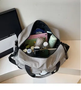 Macro view of gray travel bag interior with spacious compartments for various personal items
