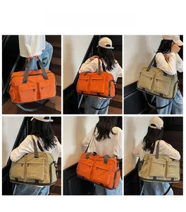 Detail shots of large travel bags in orange and green showing multiple zipper pockets