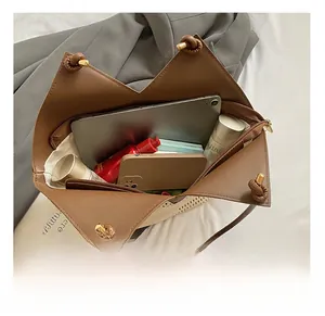 Interior view of large tote bag showing space for tablet, phone, and makeup essentials