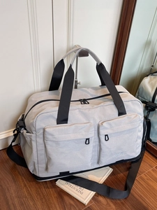 Large capacity greyish-white travel bag with dry-wet separation and multiple pockets
