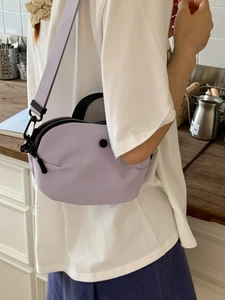 Chic lavender canvas shell-shaped crossbody bag with adjustable wide strap for women