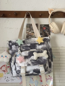 Fashionable tie-dye backpack with plush star charms and bear keychain for students