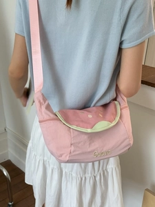 Pink canvas guava crossbody bag with fruit embroidery and adjustable shoulder strap