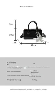 Detailed size specifications for the black patent leather crossbody bag with silver star charm