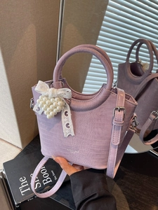 Purple faux crocodile texture mini handbag with a pearl lace bow charm for women