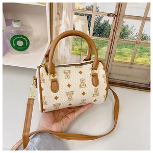Detailed view of mini Boston bag with bear monogram print and leather top handles