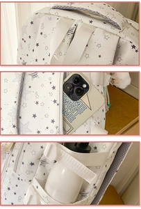 Detail showing the sturdy top handle, rear phone pocket, and side water bottle holder