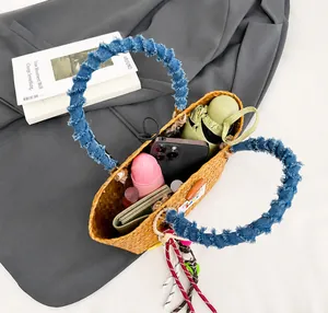 Top-down view of woven beach bag showing large capacity for phone, wallet and cosmetics