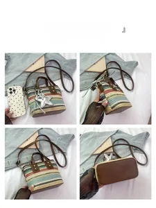 Detail views of striped woven beach bag with brown leather base and star charm accessory