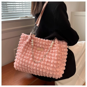 Pink bubble pleated tote bag featuring pearl chain details and leather shoulder straps