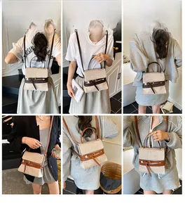 Détails du sac en toile avec sangles en cuir et styles de portage polyvalents sur modèle