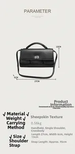 Minimalist black tote bag dimensions 27x6x13cm with silver clasp and adjustable strap