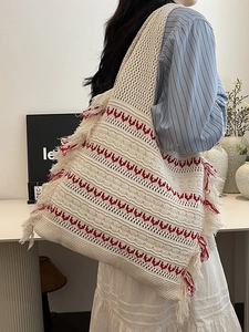 Bohemian knit tote bag with red geometric waves and decorative side fringe tassels