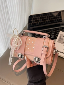 Pink cylinder woven handbag with scattered rhinestones and pearl lace bow charm decoration