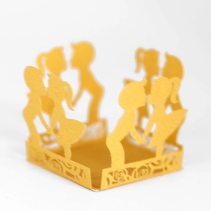 Golden laser cut paper lanterns featuring boy and girl silhouettes with rose floral accents