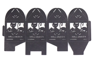 Detailed laser-cut black paper Halloween favor box featuring pumpkin and cat patterns