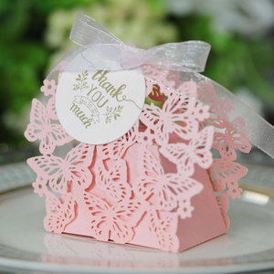 Pink laser-cut butterfly gift box with white organza ribbon and Thank You tag